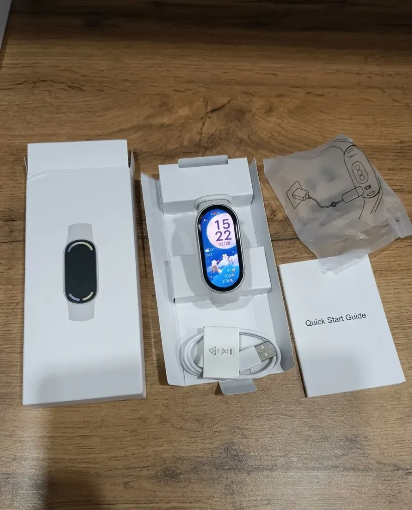 Xiaomi Smart Band 10 box contents with charger and quick start guide